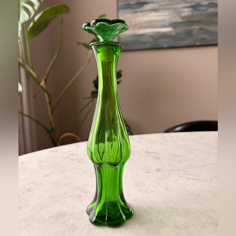 Avon green flower top glass perfume bottle. Vintage